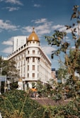 Vintage photograph of the Imperial Palace surrounded by lush greenery