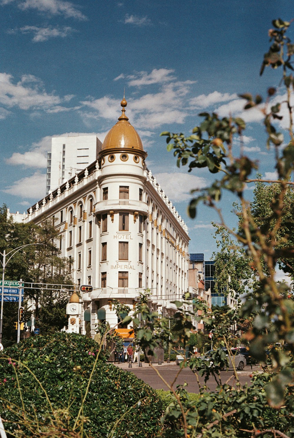 a large white building with a golden dome