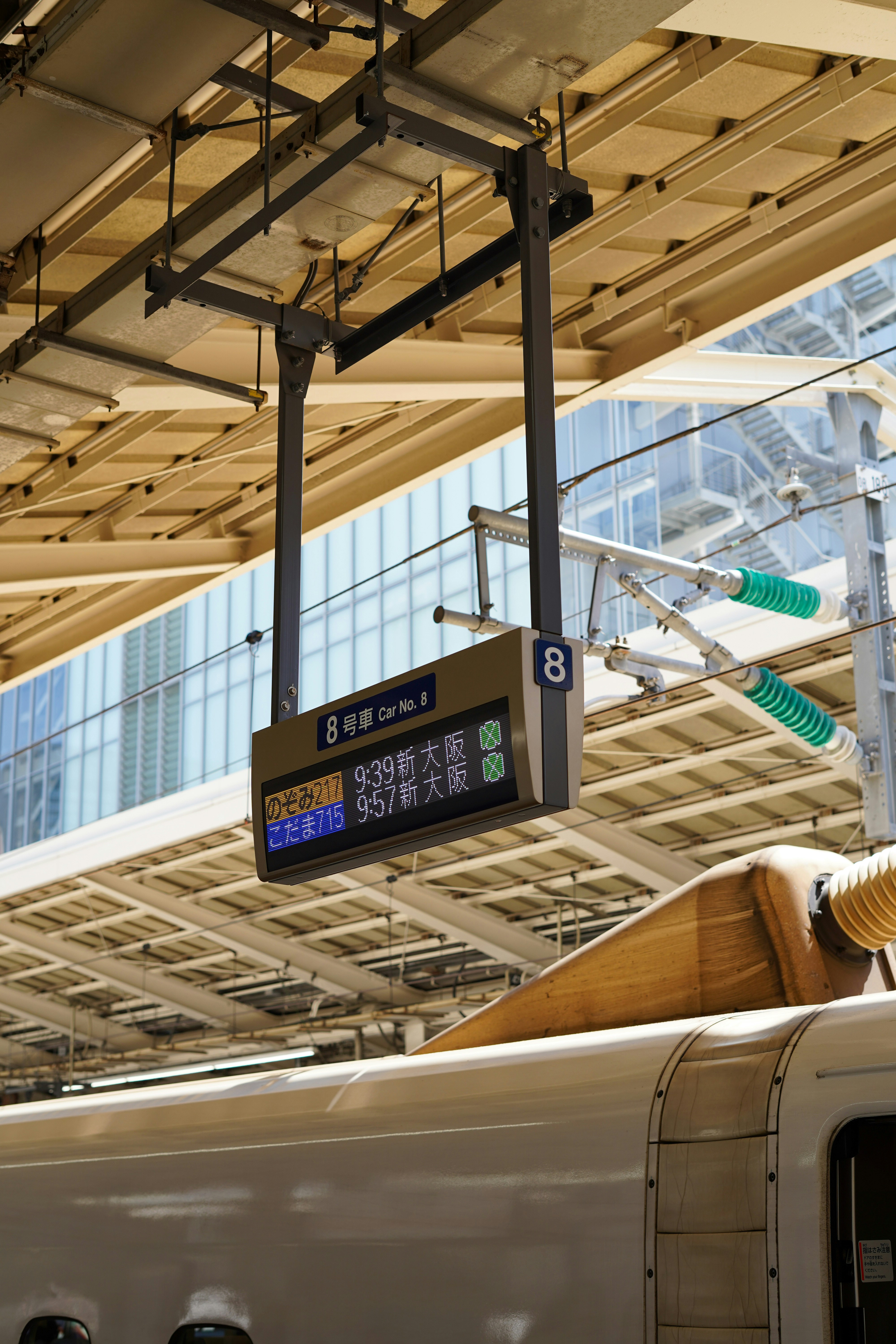 Car number display on a shinkansen platform ceiling (Car 8)