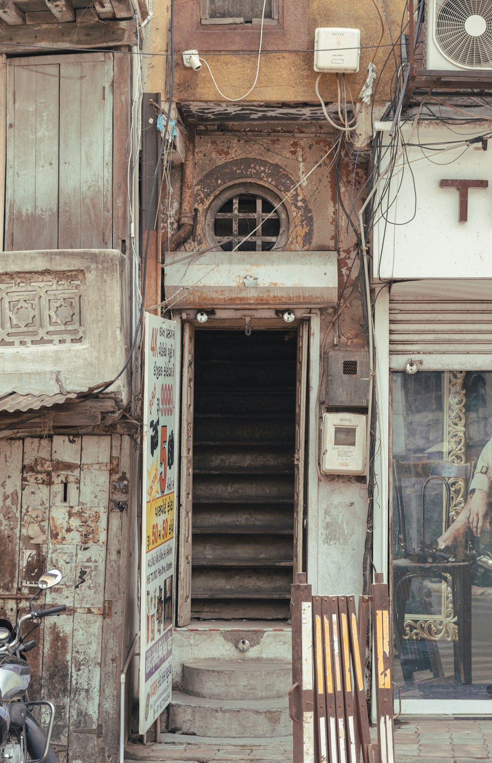 a building with a bunch of windows and stairs