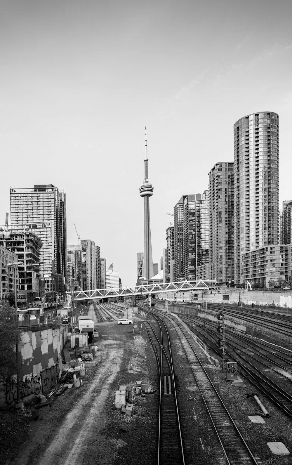 a black and white photo of a train track