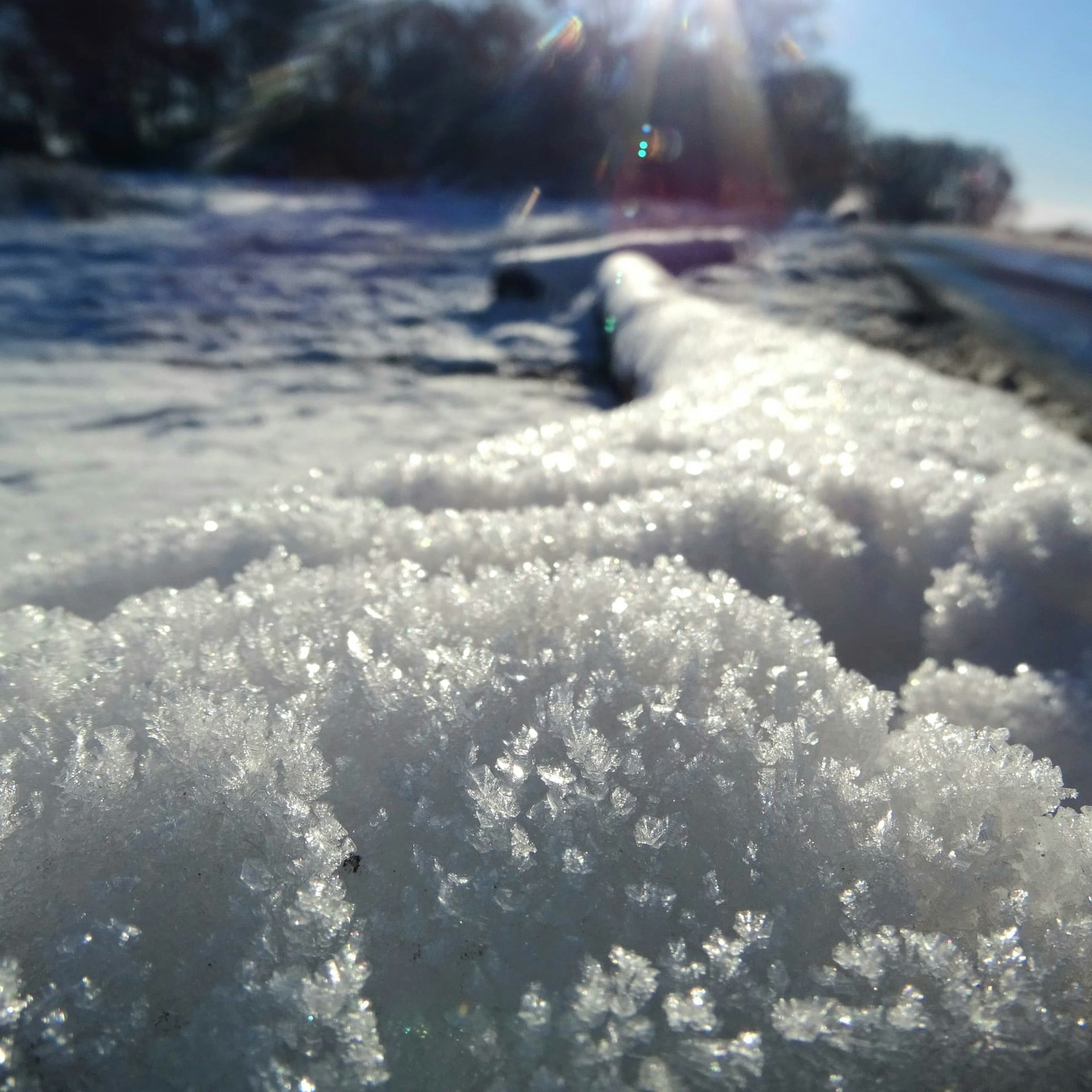 woman wearing yellow long-sleeved dress under white clouds and blue sky during daytime