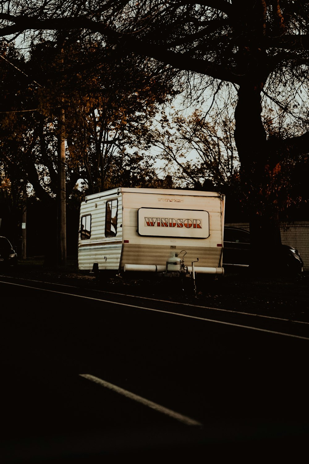 a trailer parked on the side of the road