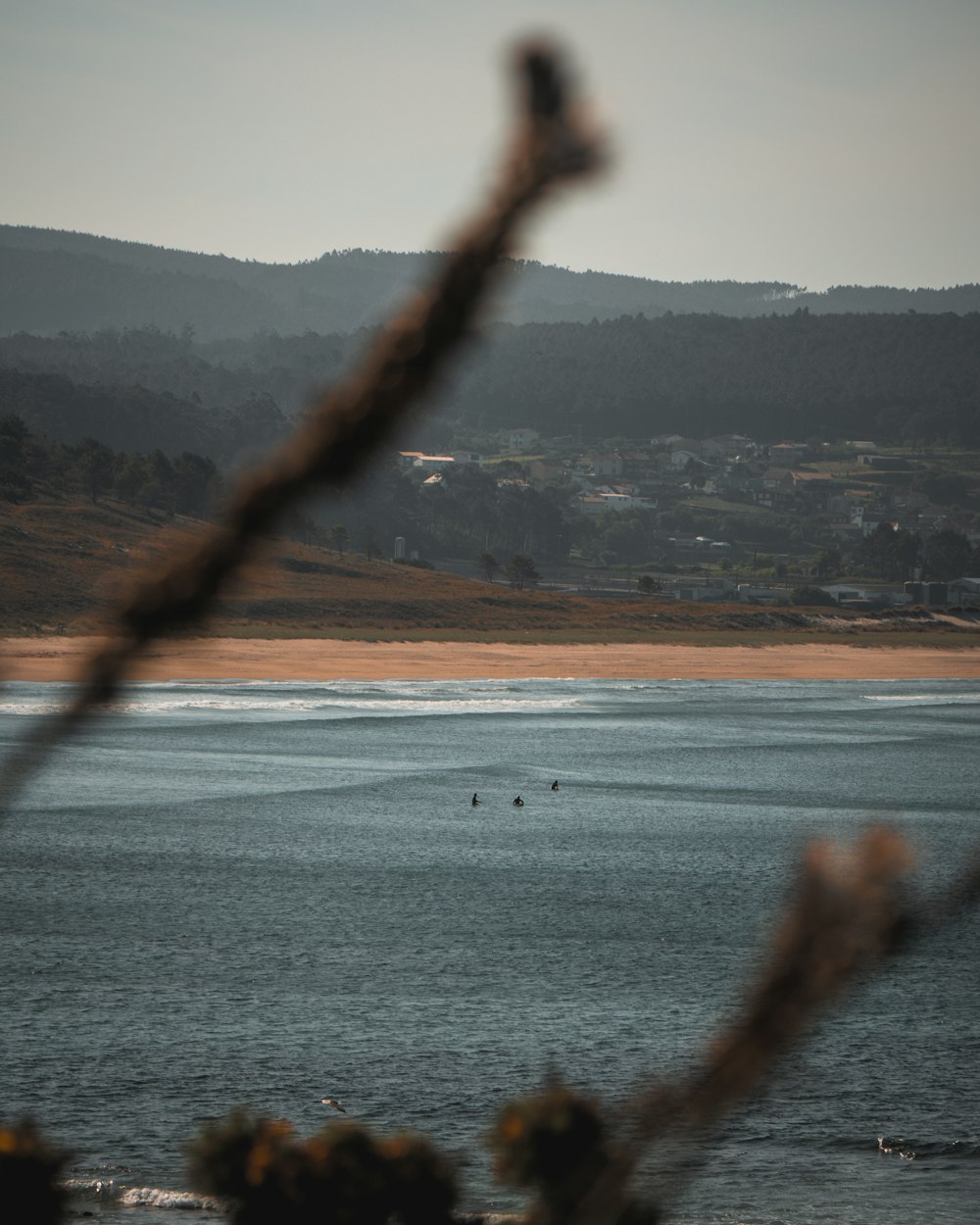 a body of water with a boat in the distance