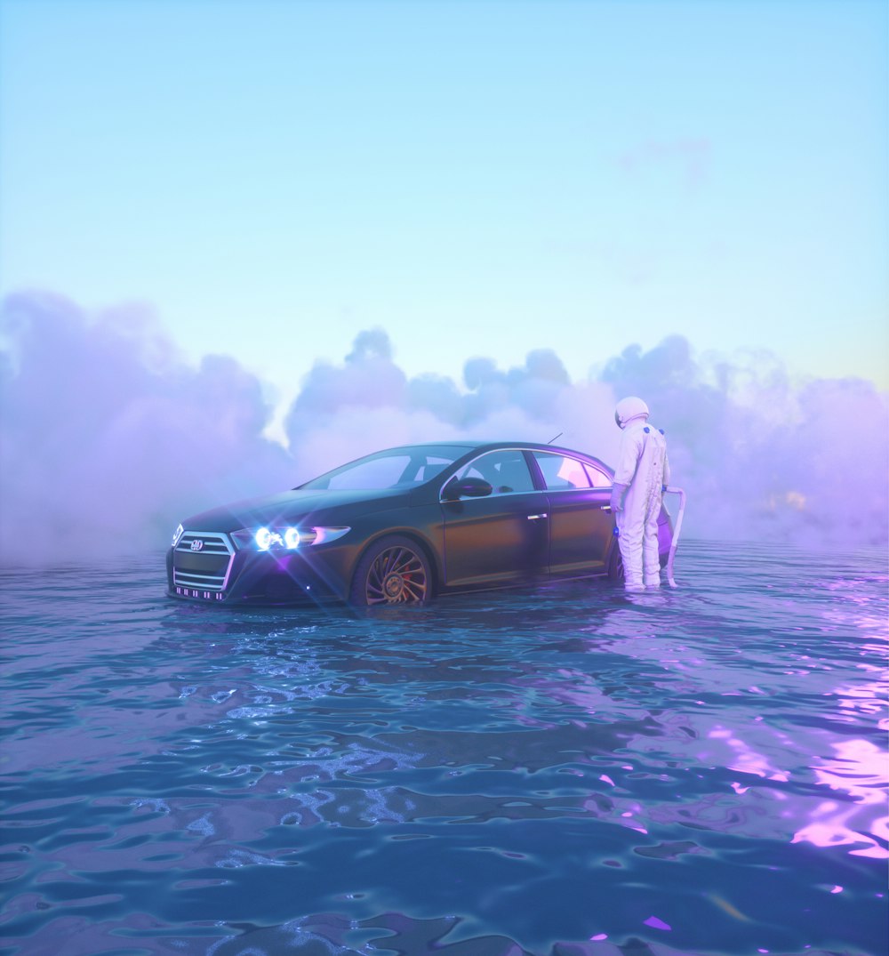 a man standing next to a car in a body of water