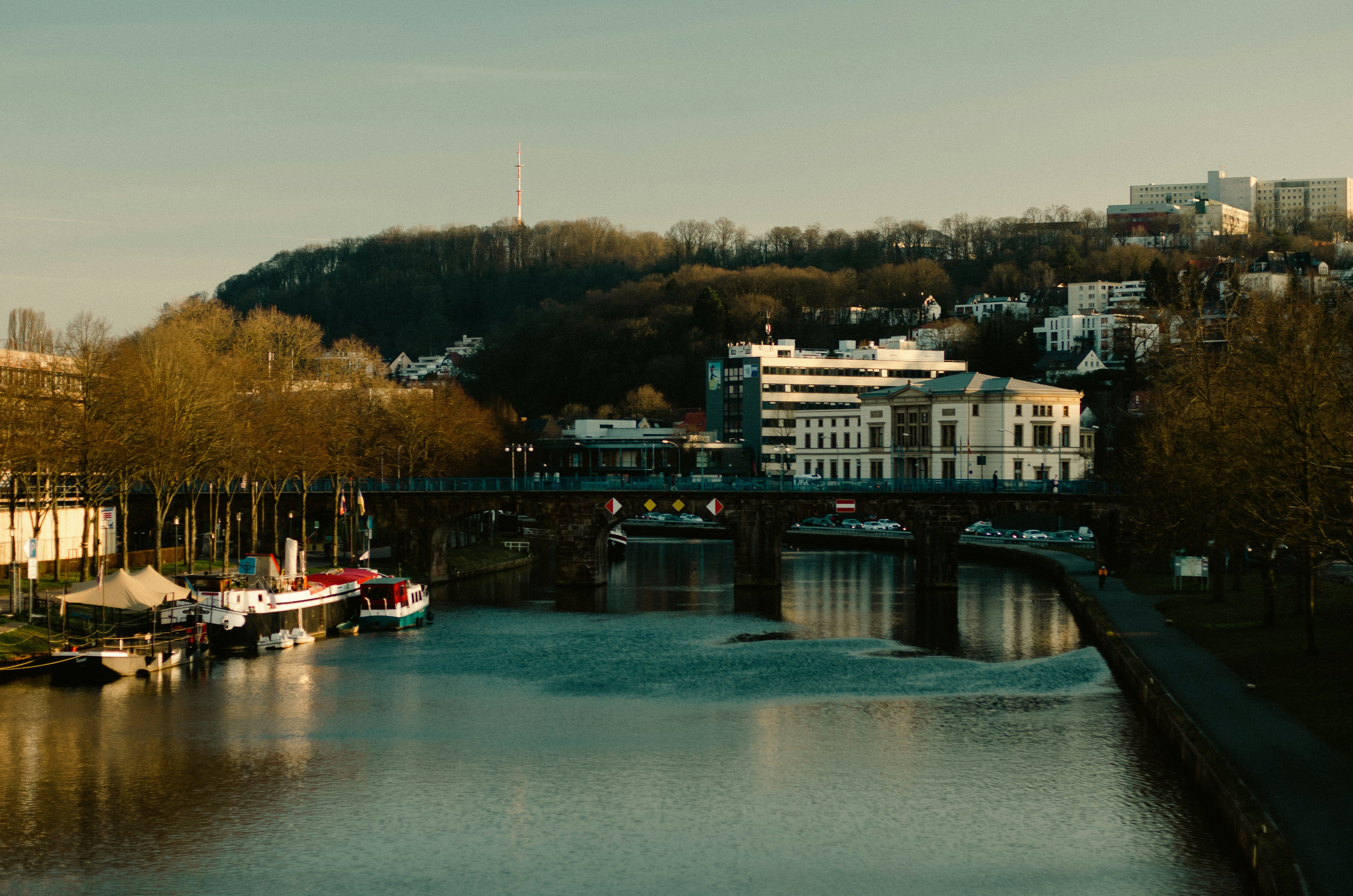 The River Avon passing through the city of Bristol with historic buildings and modern infrastructure