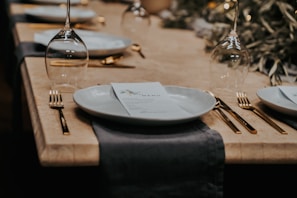 Elegant table setting at a traditional Piemonte restaurant with local dishes and wine