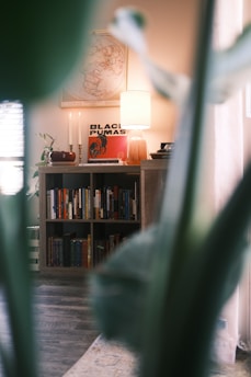 A cozy corner filled with Taylor Swift albums, lyric books, and a softly glowing lamp.