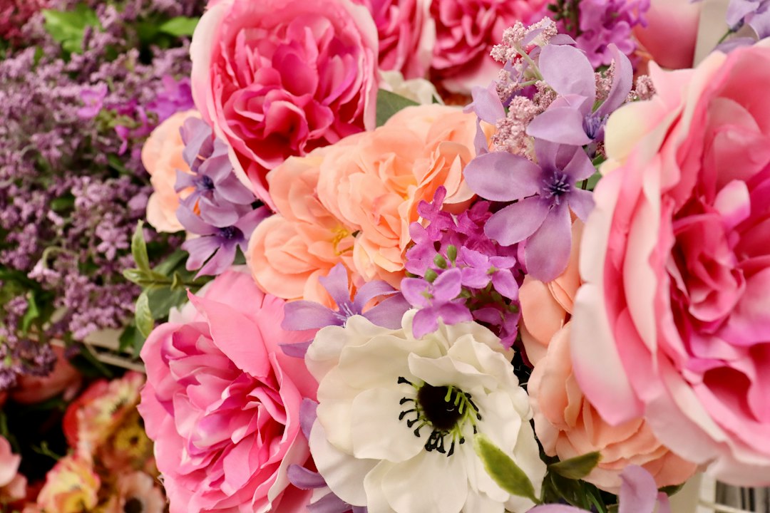 pastel floral casket spray with garden roses and lilies pastel floral casket spray with garden roses and lilies