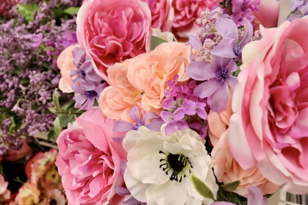 a bunch of flowers that are in a vase