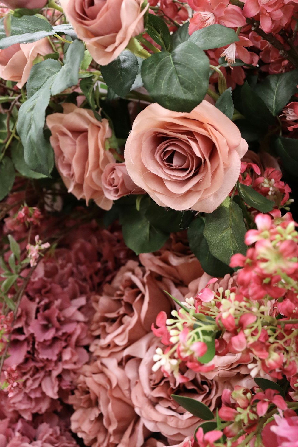 a bunch of flowers that are in a vase