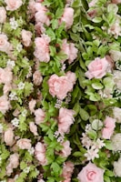 A stunning floral arrangement featuring pink and white flowers.