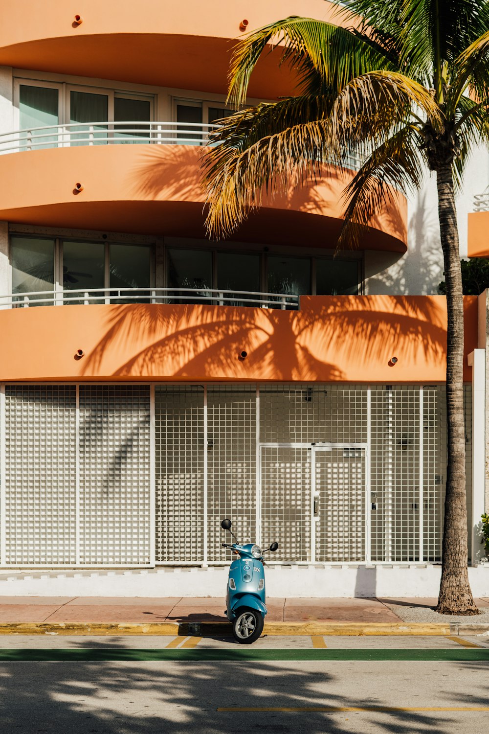 a scooter is parked in front of a building