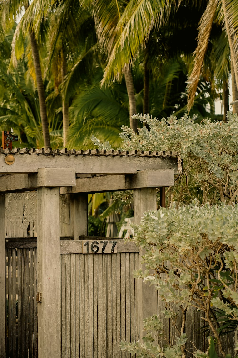 a wooden building with a clock on the top of it