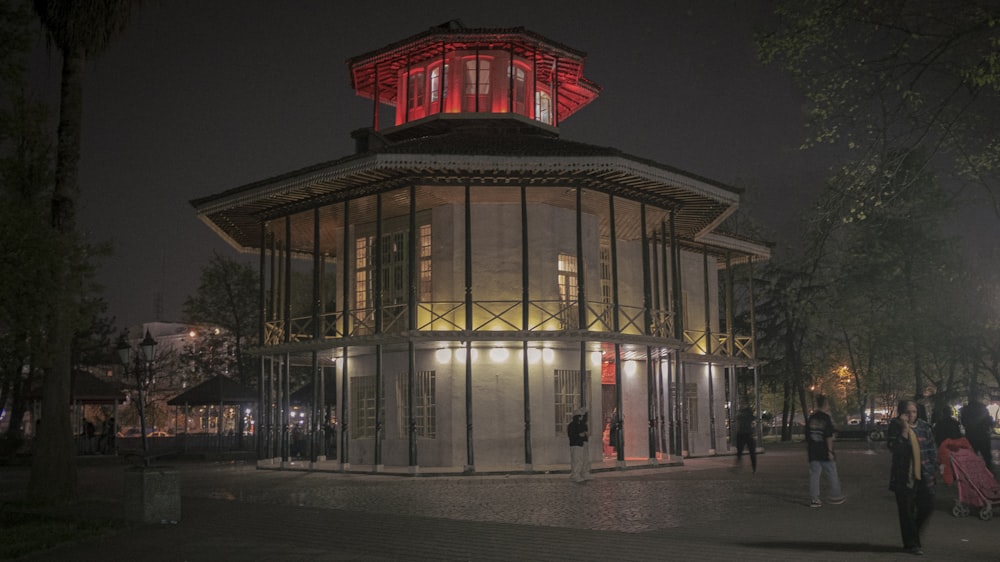 a building with a red light on top of it