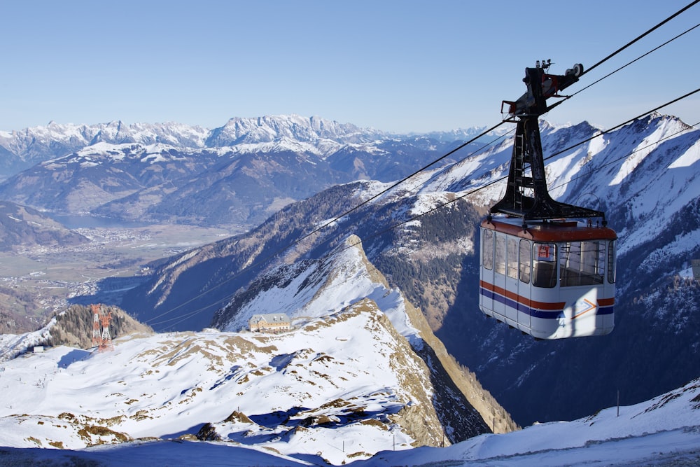 a ski lift going up the side of a mountain