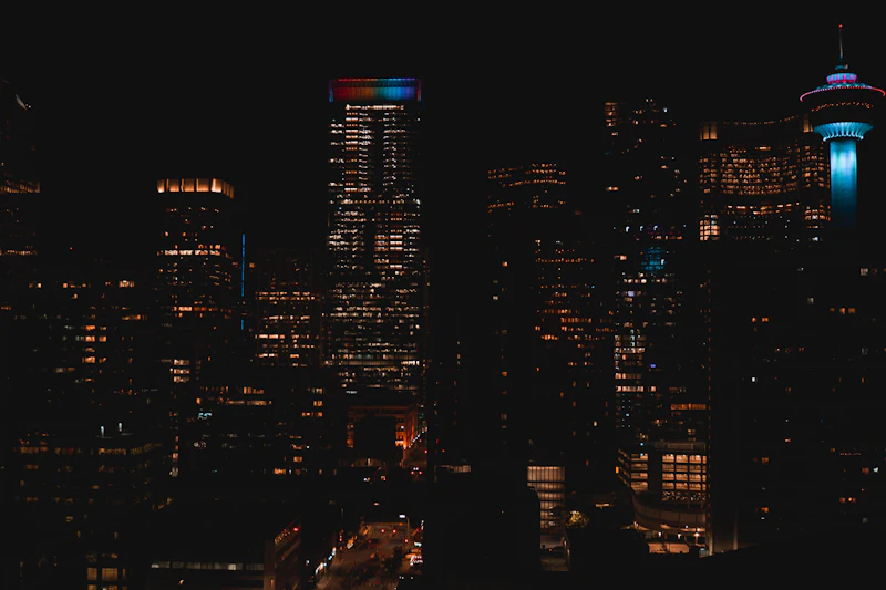 City lights at night through a window