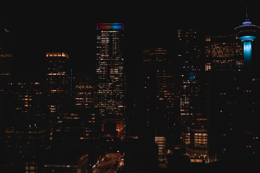 a view of a city at night from the top of a building