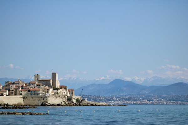 The old town and the mountains across the bay — Antibes, France