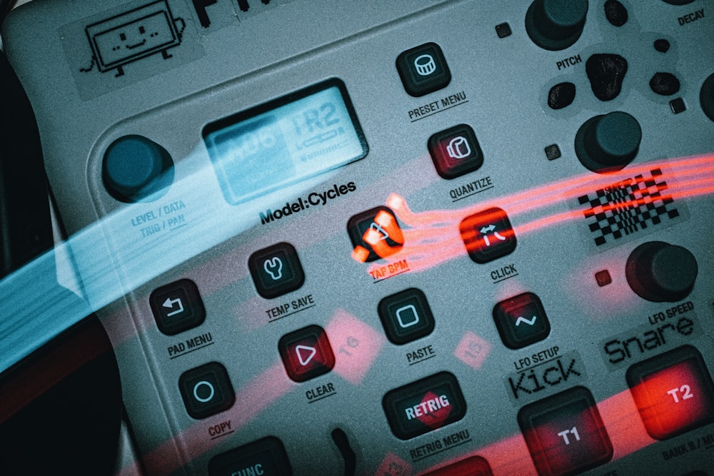 a close up of a calculator with a blurry background