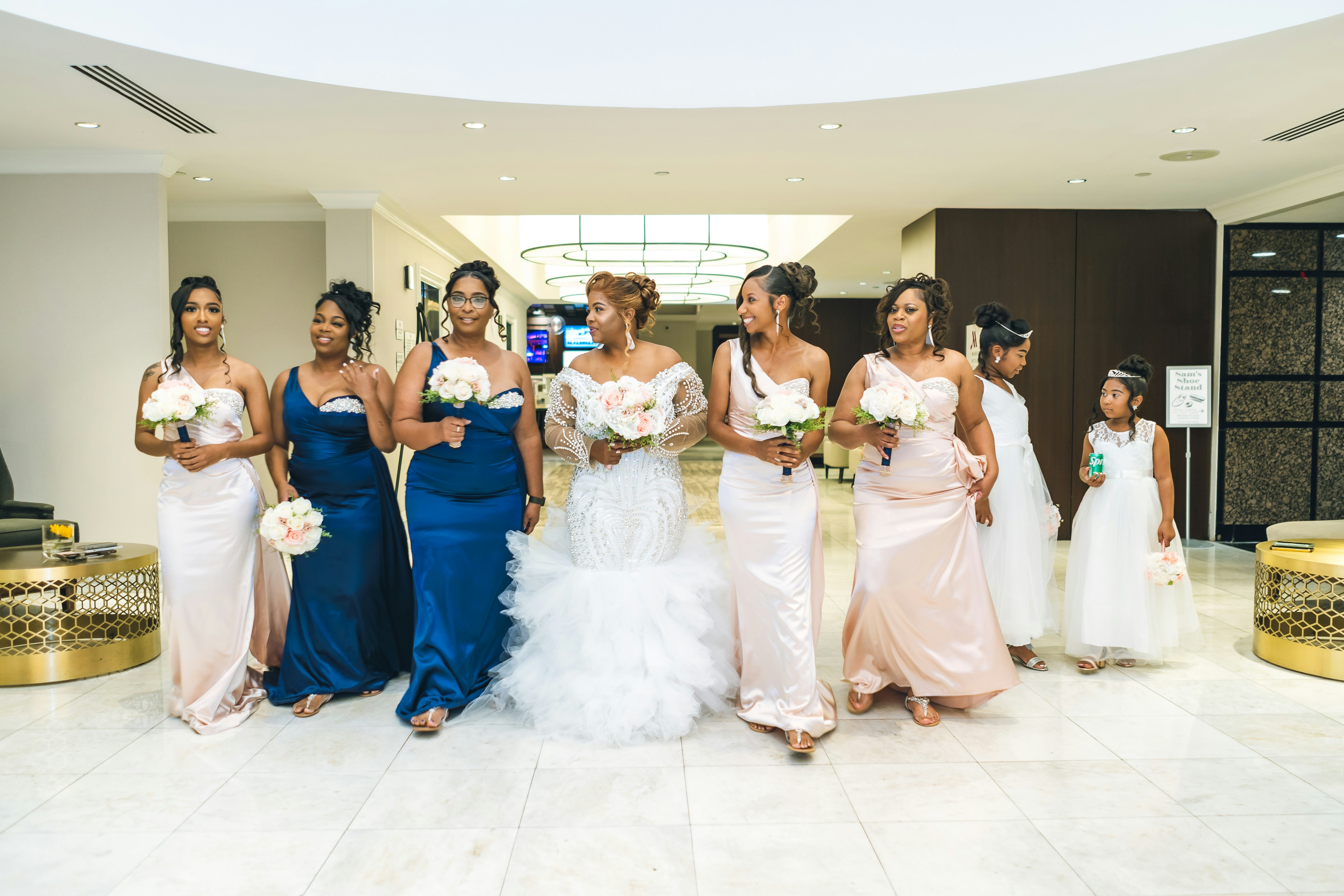 Bridesmaids diverse dresses, Wedding party color, Elegant mixed dresses, Bridesmaid bouquet lineup, ilustrasi artikel Stylish Bridesmaids: How to Perfectly Mix and Match Dresses 7