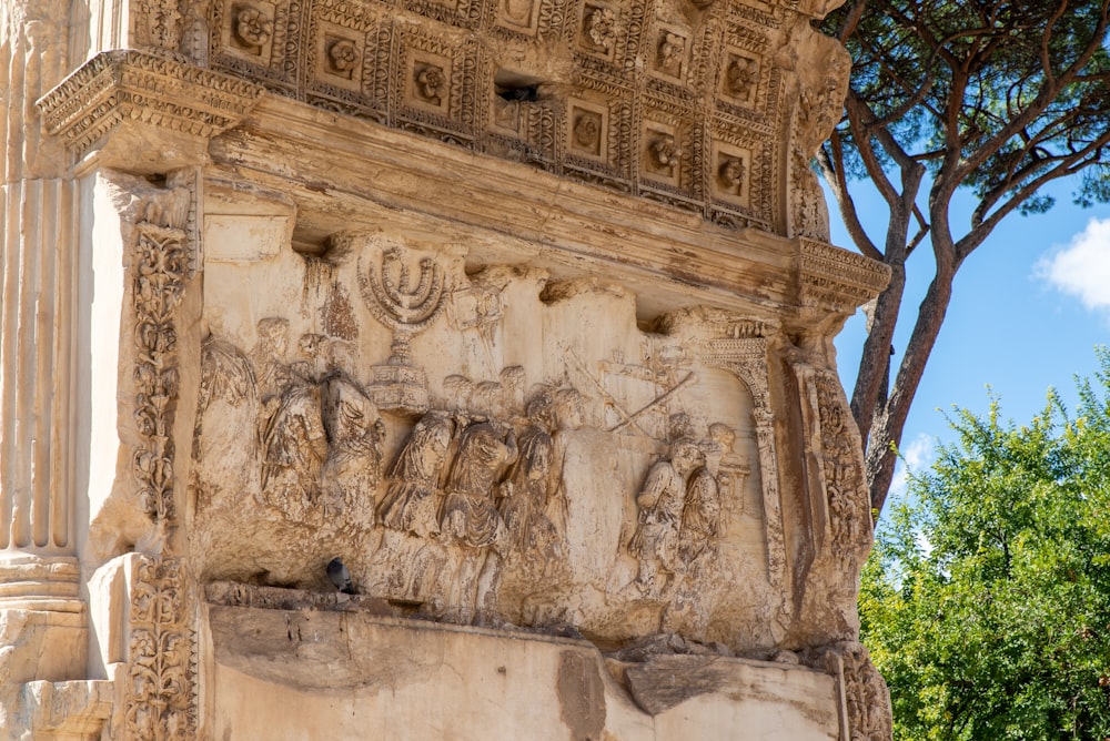 a close up of a building with a tree in the background