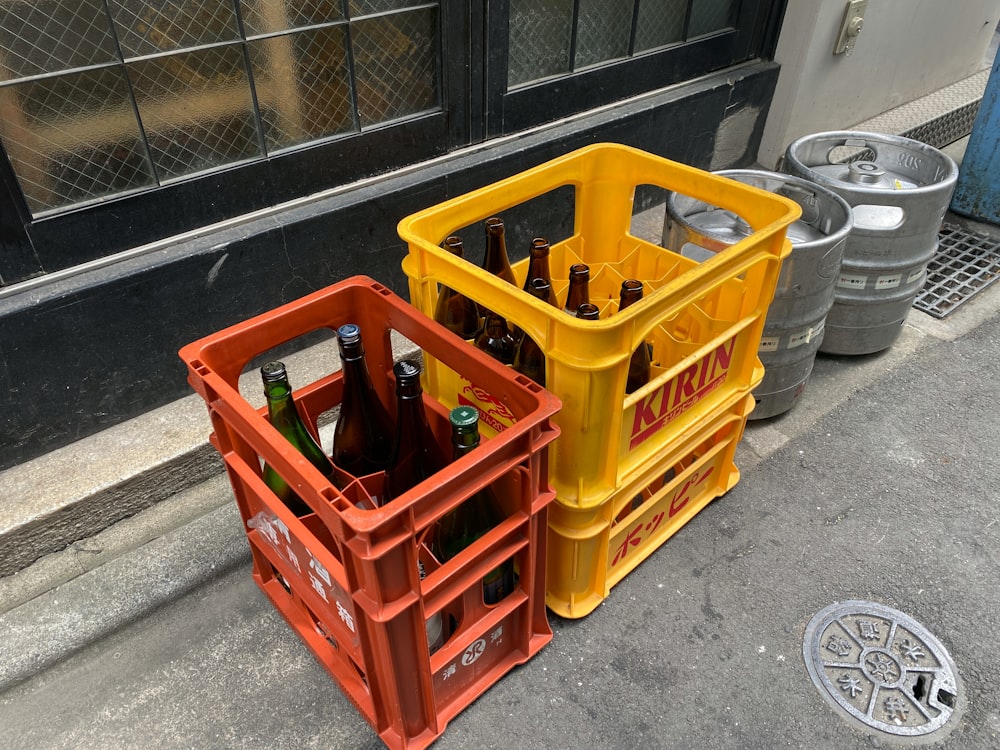 a couple of crates sitting on the side of a road