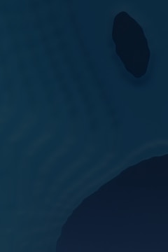 Album cover art featuring moody abstract shapes in deep blues and purples