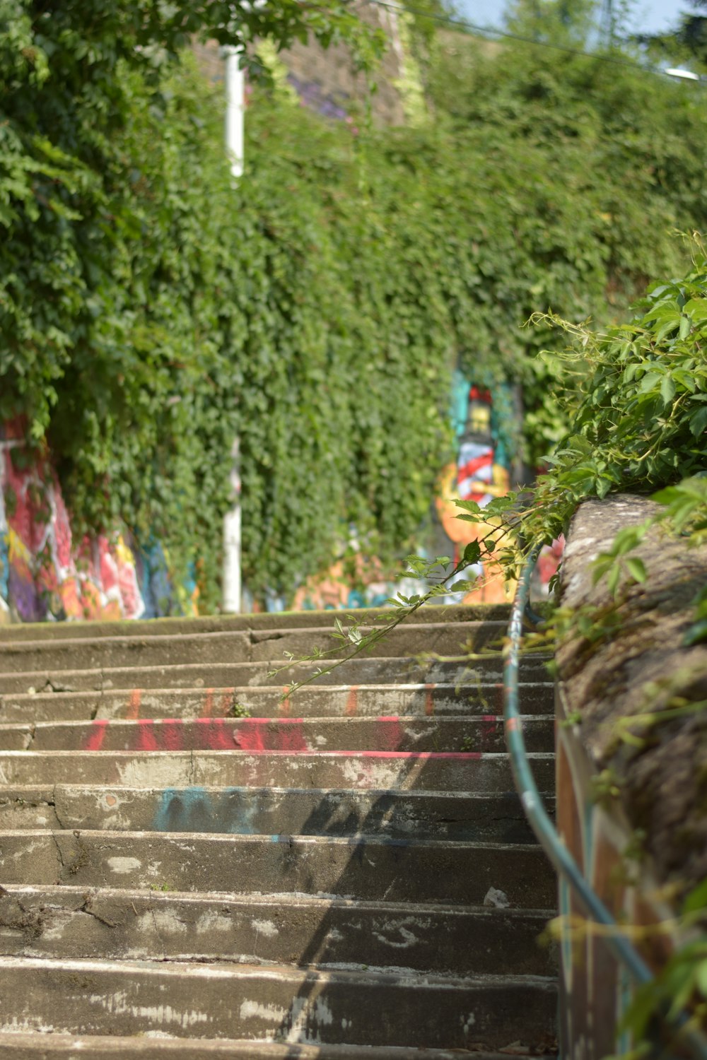a bunch of stairs with graffiti on them
