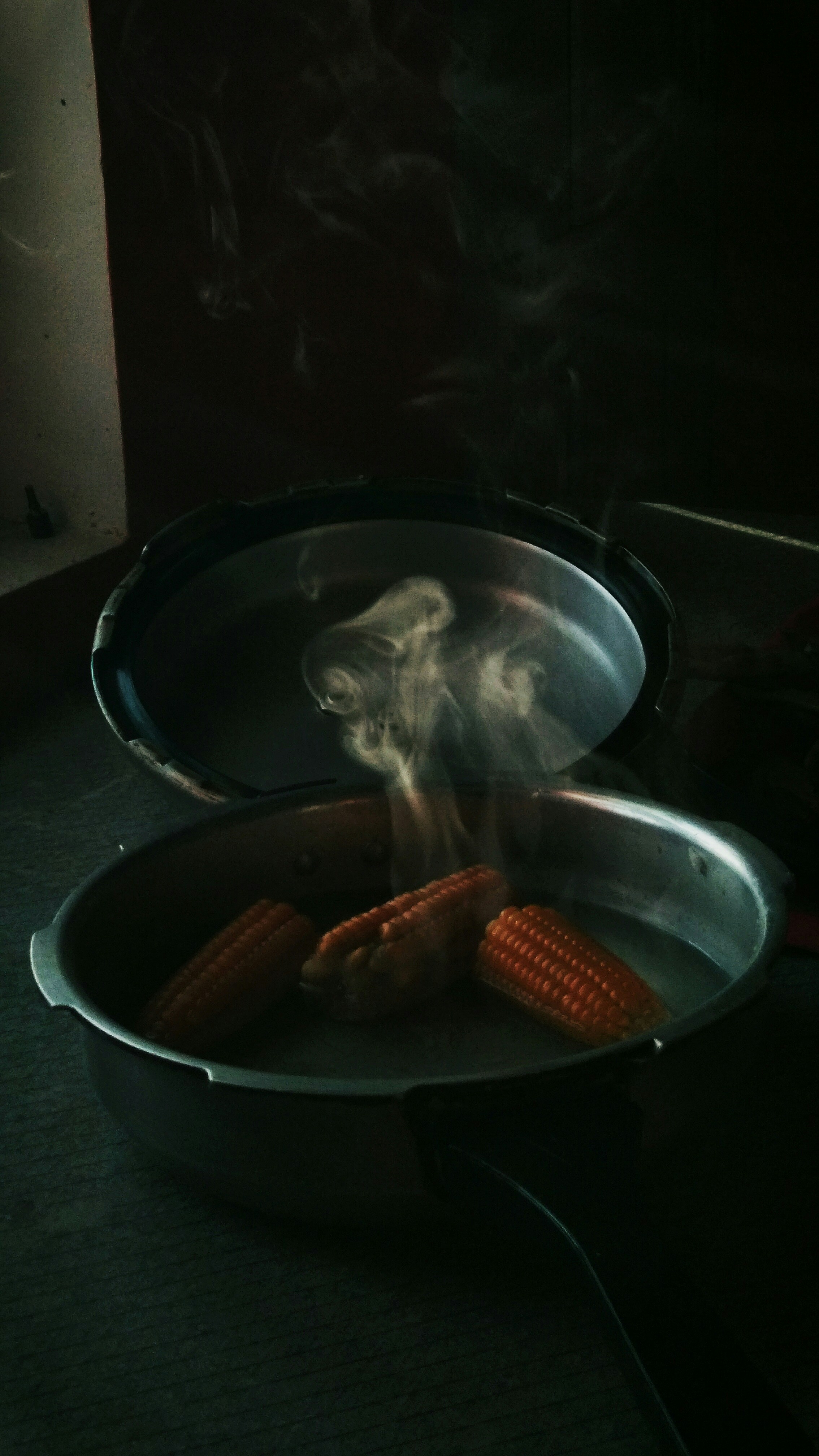 a frying pan filled with food on top of a stove