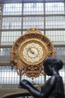 a large clock mounted to the side of a building
