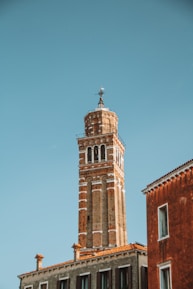 The iconic tower of the Santa Rosa City Hall against a clear blue sky in the afternoon.