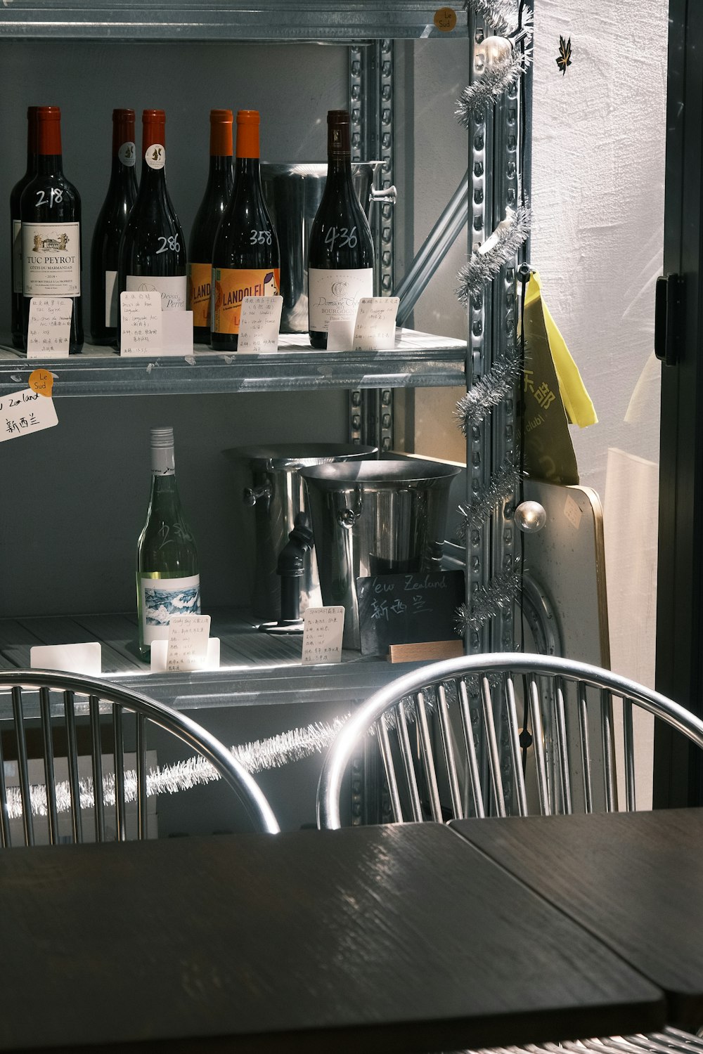 several bottles of wine are sitting on a shelf