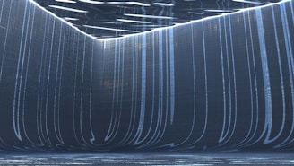 A sleek office environment bathed in deep blue ambient light with subtle sound wave visuals.