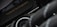 A close-up view of a mechanical or technological component with a sleek design and metallic textures is displayed. The phrase 'Power Up Your Imagination' is etched on the surface, suggesting encouragement or inspiration, possibly for creative or innovative activities.