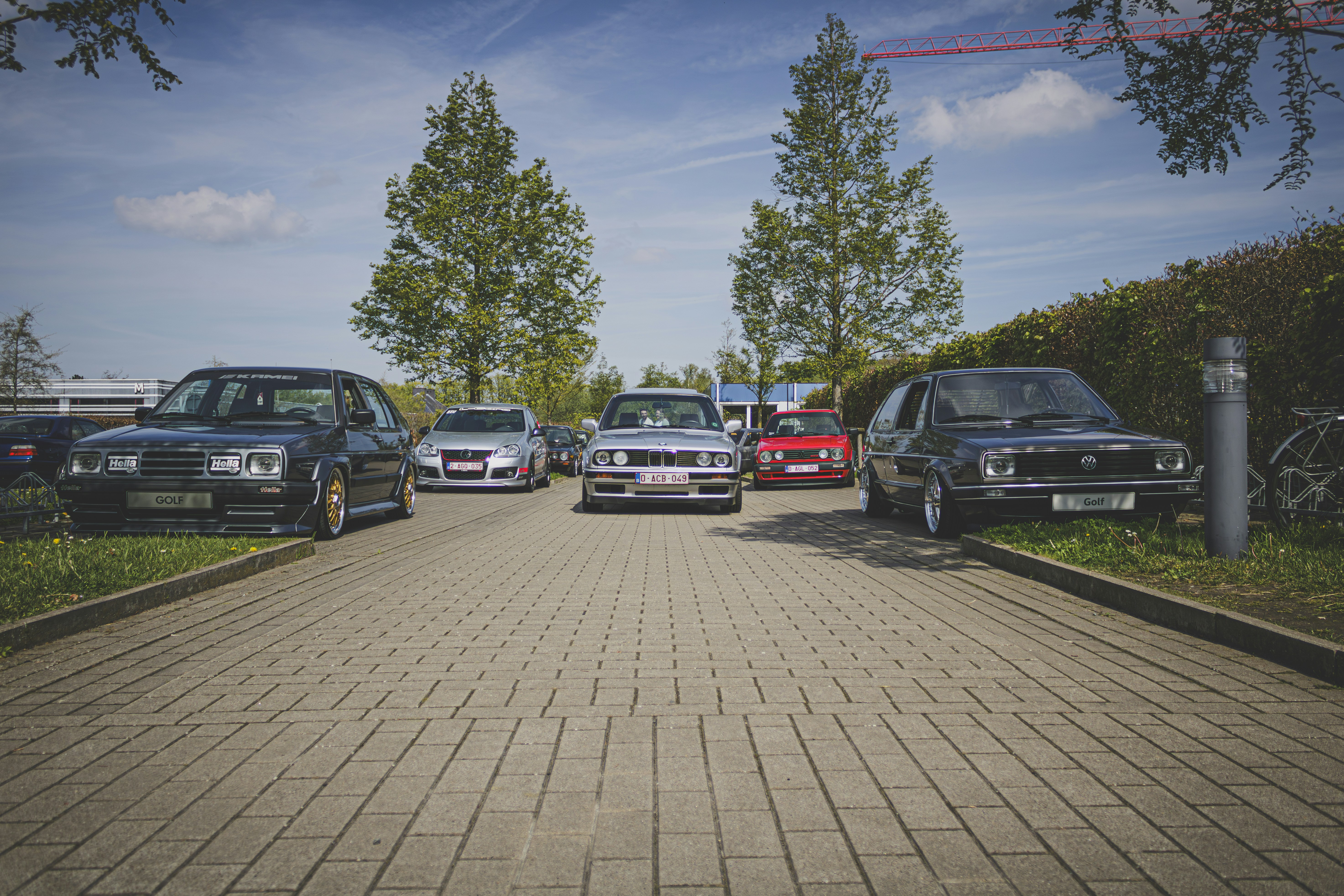 a group of cars parked next to each other