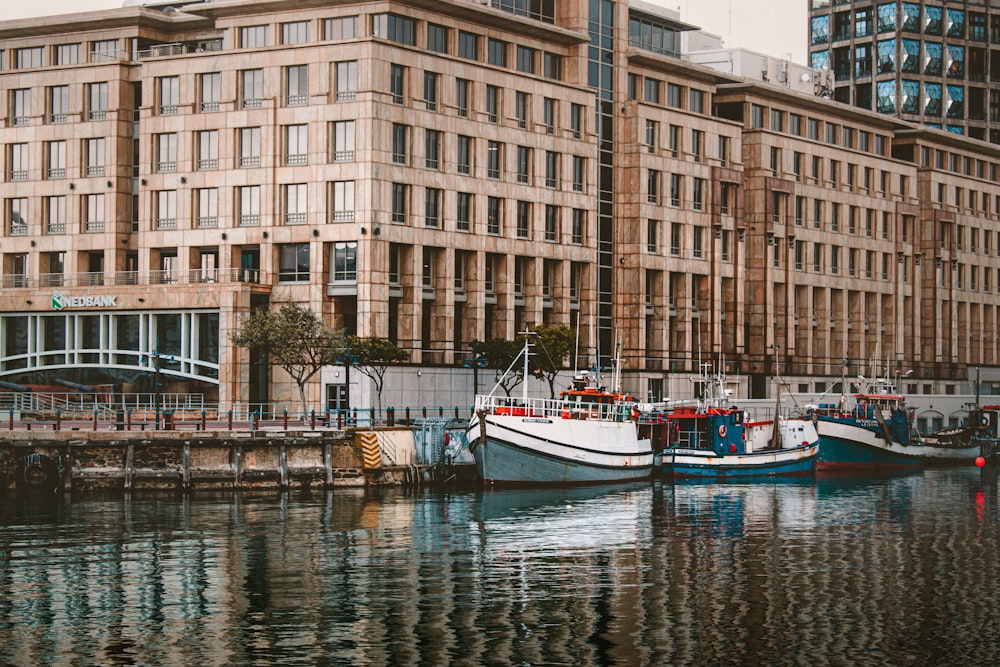 a couple of boats that are sitting in the water