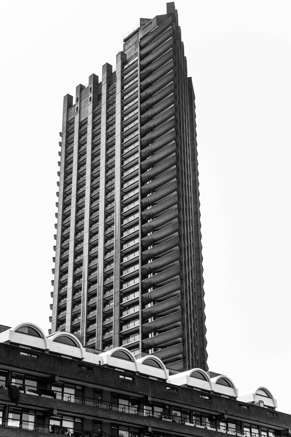 a black and white photo of a tall building