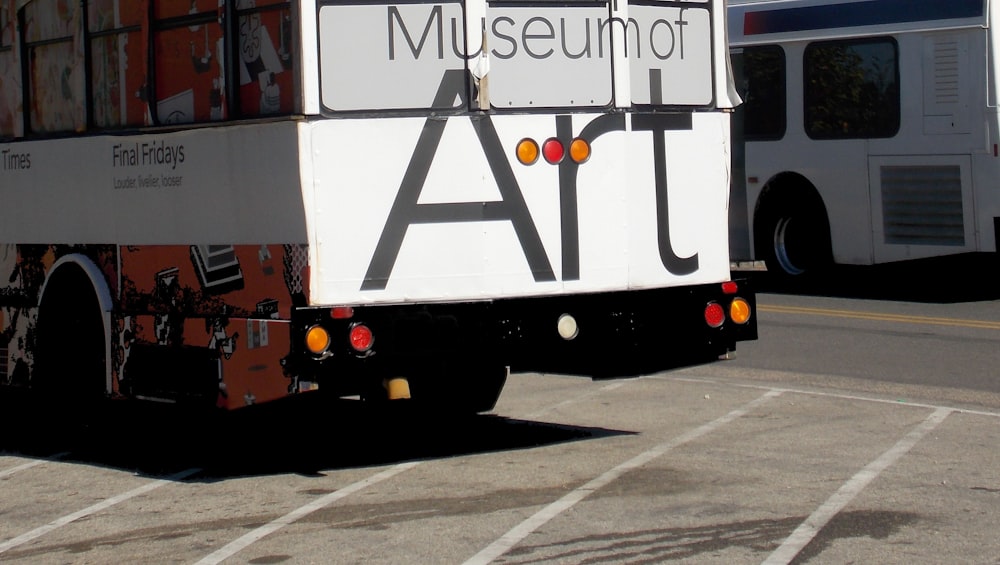 a large truck with a sign on the back of it