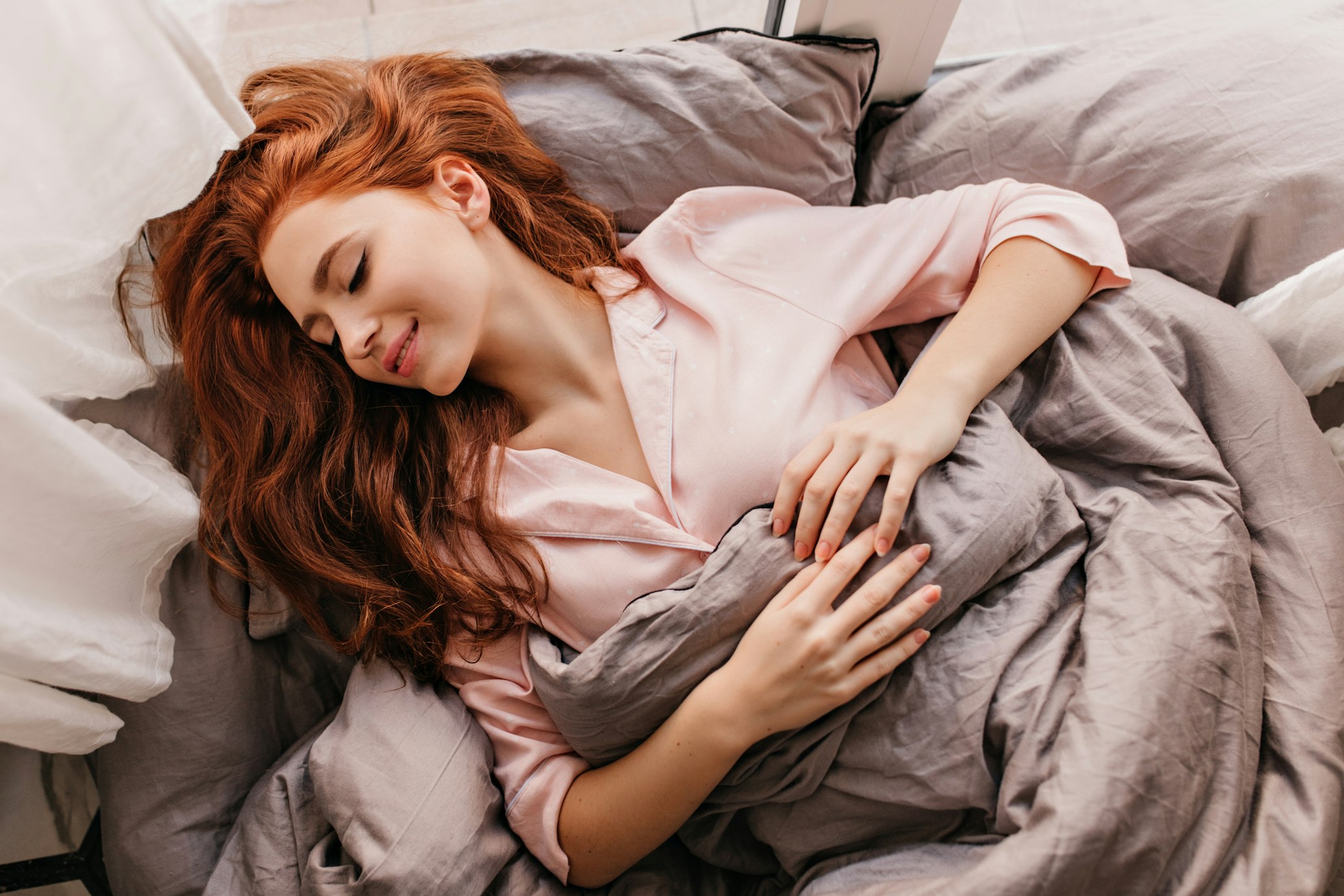 Person enjoying perfect sleep environment