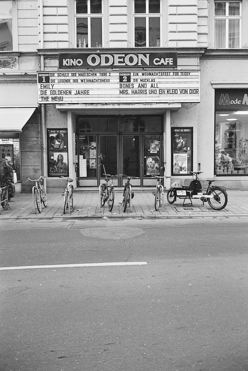 a black and white photo of a movie theater