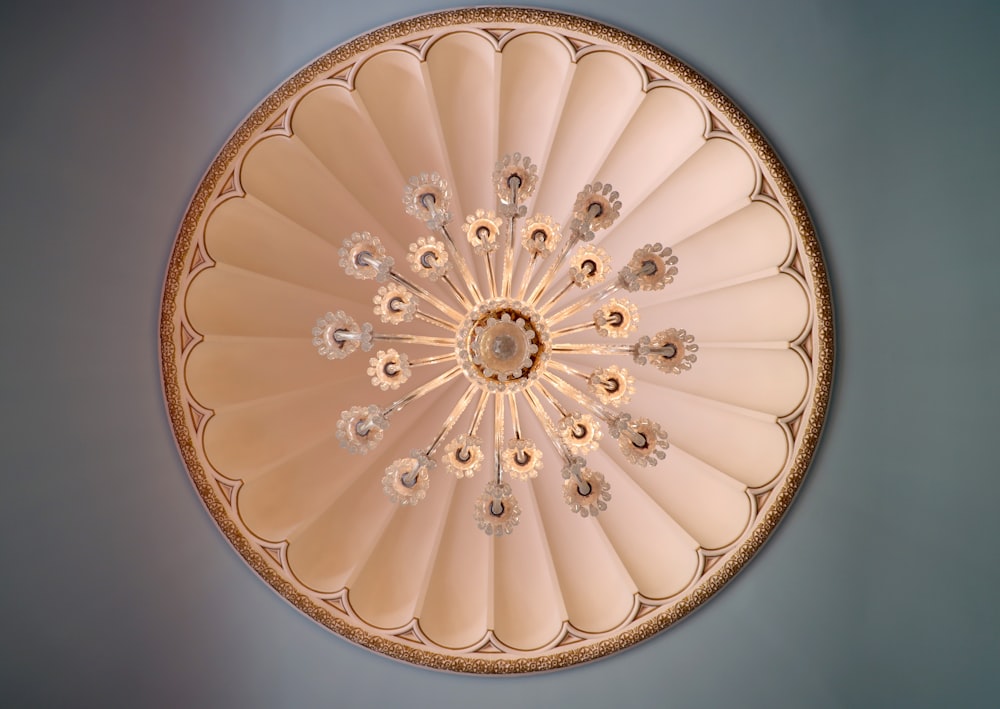 a circular light fixture hanging from the ceiling