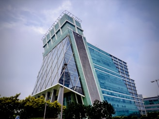 a very tall building with a sky background