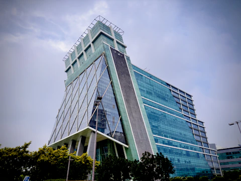 a very tall building with a sky background