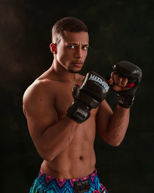 Combat sports athlete preparing for a match with determined eyes.