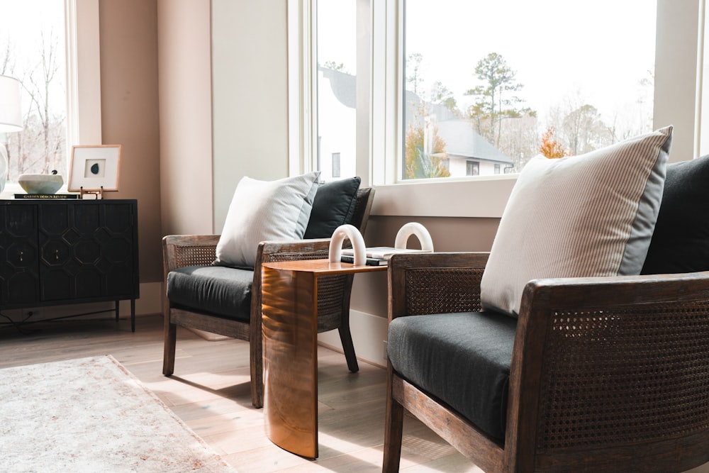 a living room filled with furniture next to a window