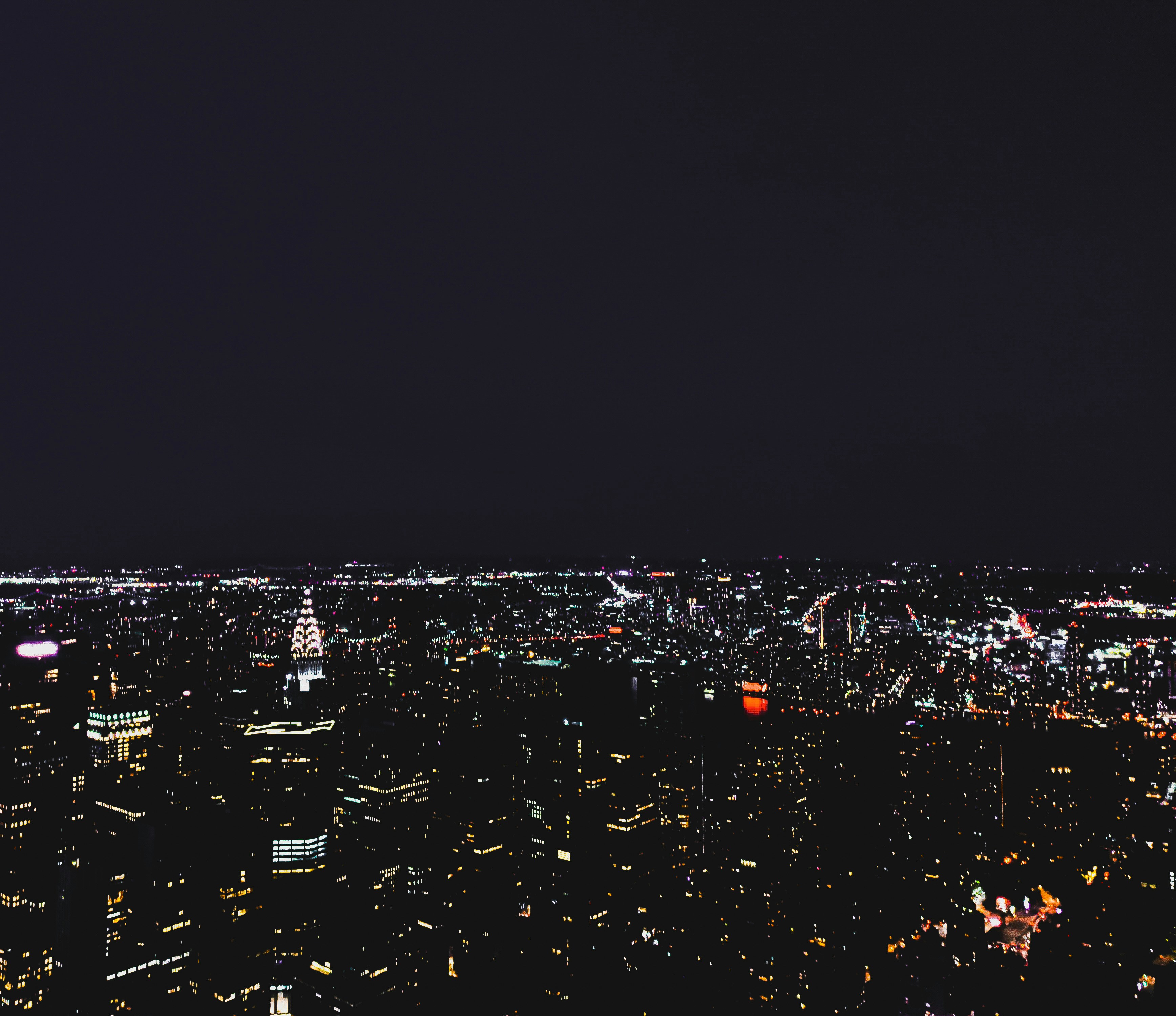 Aerial view of NYC at night.