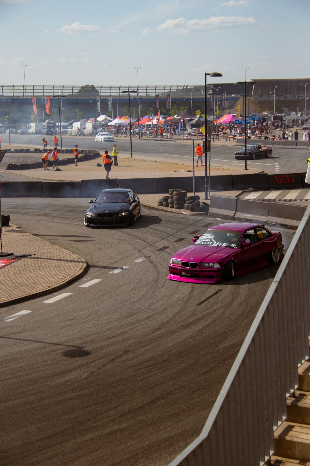 a couple of cars that are on a track