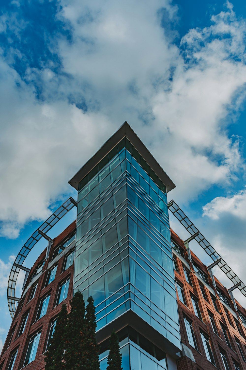 a very tall building with a sky background