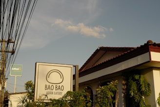 a building with a sign that says bao bao above it